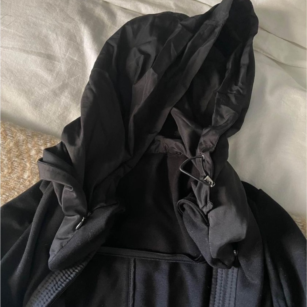 Ann Taylor jacket in clack with zip up hood. Lightweight material yet warm.